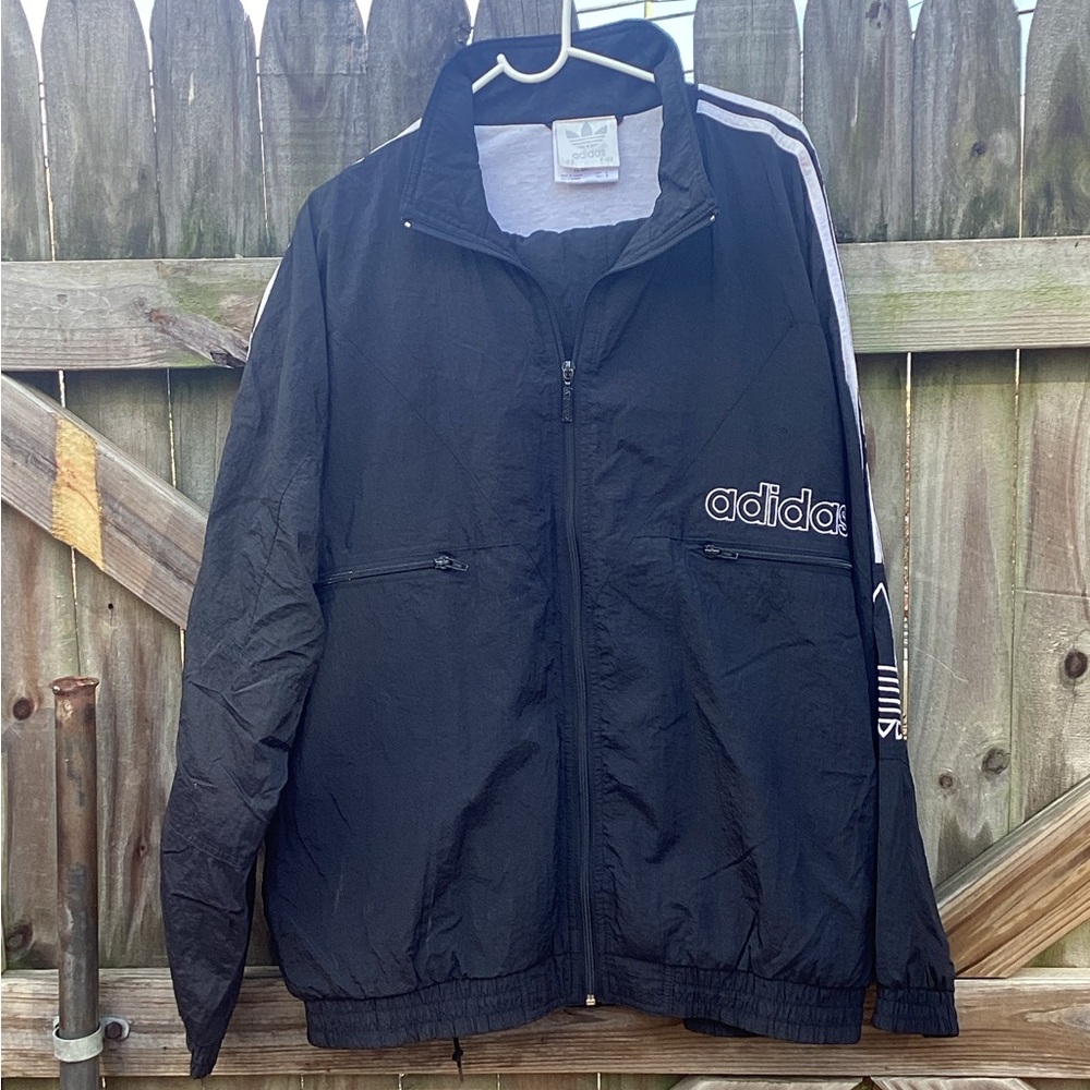 Black men’s Adidas tracksuit jacket size large